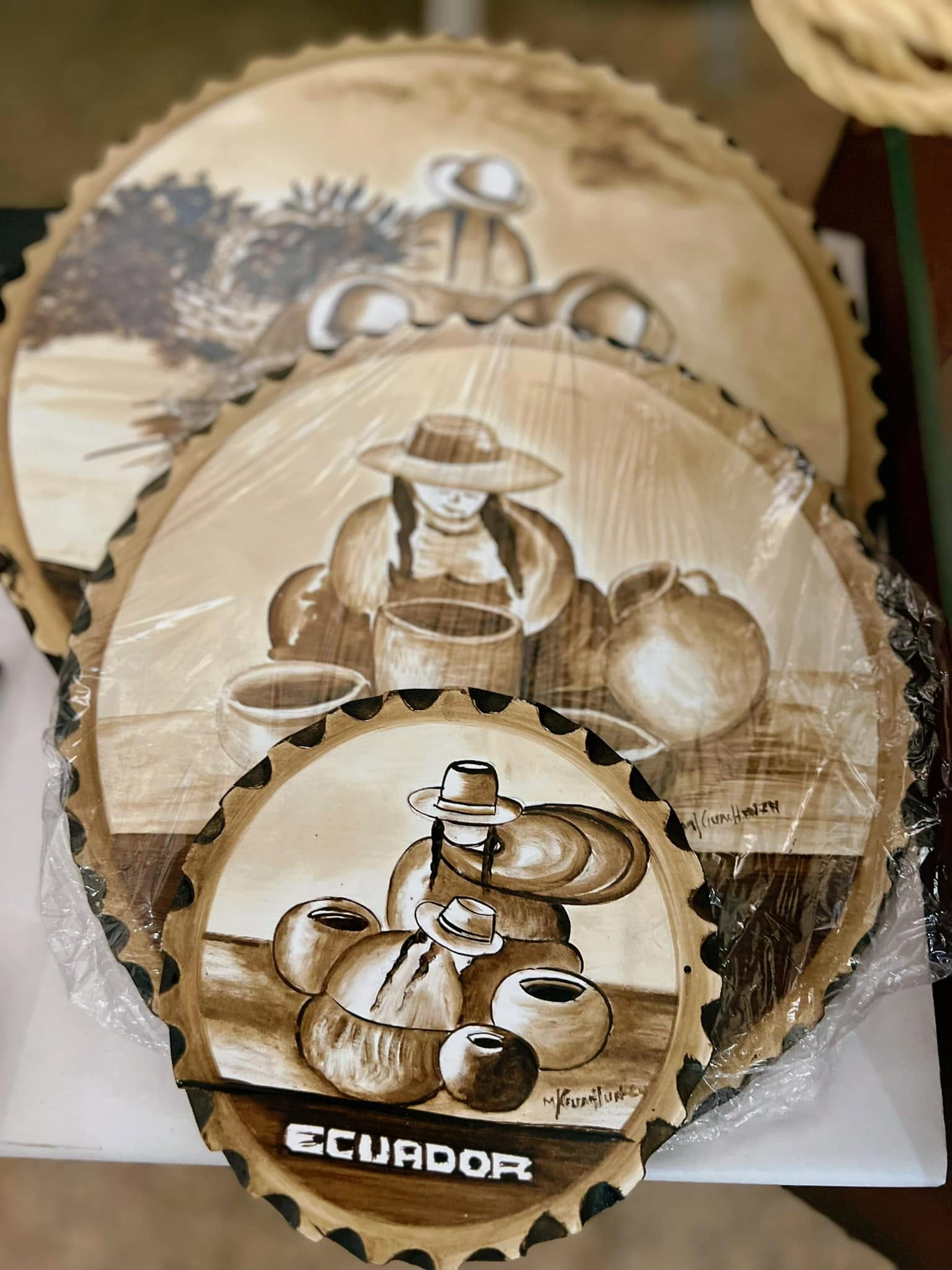 Exhibición de cuadros y pirograbado